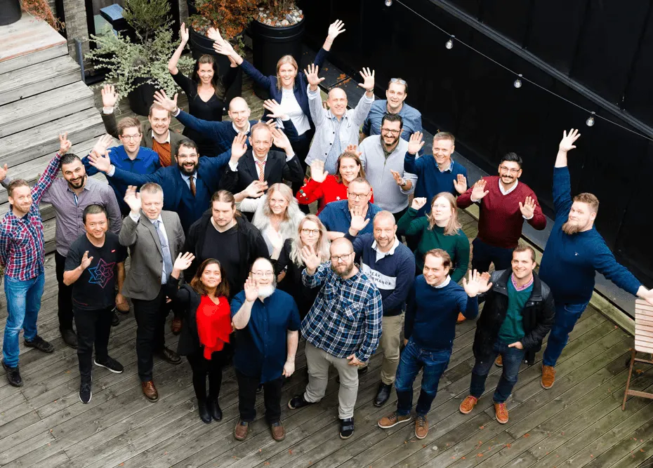 The Edument team waving to the camera
